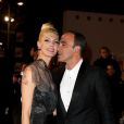 Nikos Aliagas et sa compagne Tina Grigoriou, sur le tapis rouge de la 16e édition des NRJ Music Awards à Cannes, le samedi 13 décembre 2014.