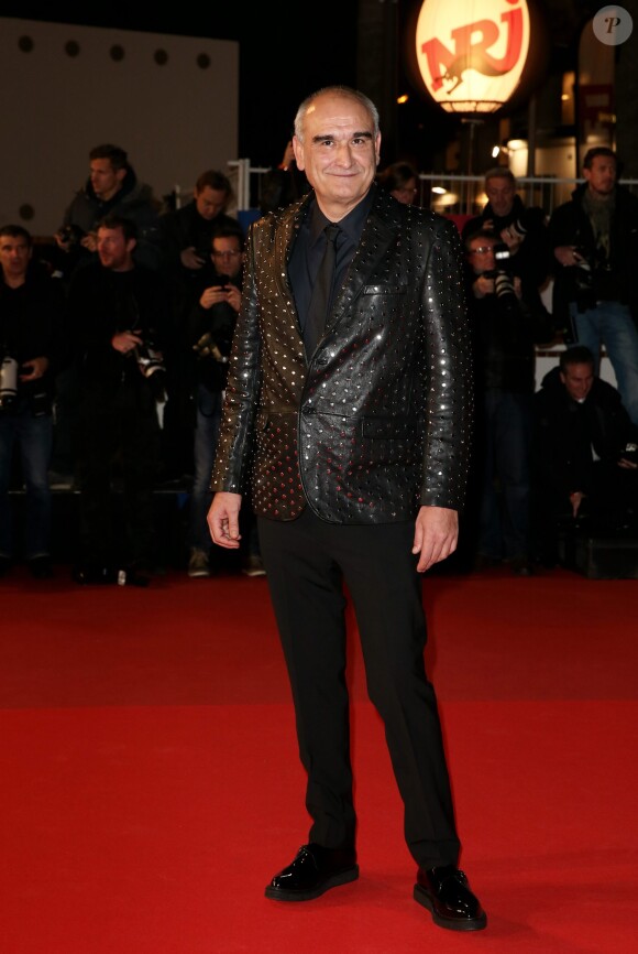 Pascal Nègre, sur le tapis rouge de la 16e édition des NRJ Music Awards à Cannes, le samedi 13 décembre 2014.