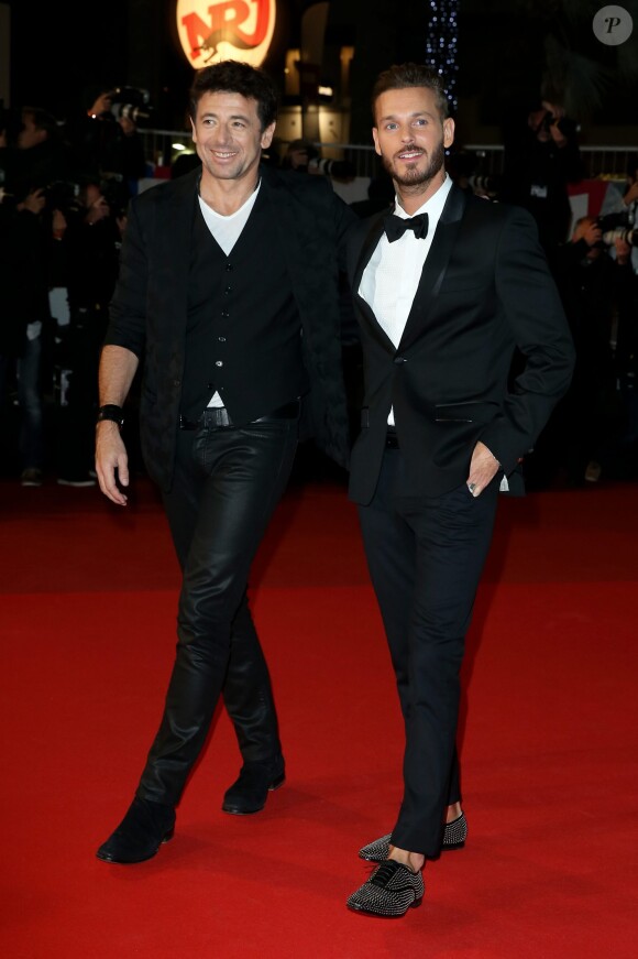 Patrick Bruel et M.Pokora, sur le tapis rouge de la 16e édition des NRJ Music Awards à Cannes, le samedi 13 décembre 2014.