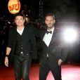 Patrick Bruel et M.Pokora, sur le tapis rouge de la 16e édition des NRJ Music Awards à Cannes, le samedi 13 décembre 2014.