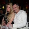 Exclusif - Jean Marie Bigard et sa femme Lola passent une soirée au restaurant le Fouquet's et au Queen à Paris Le 26 décembre 2014.
