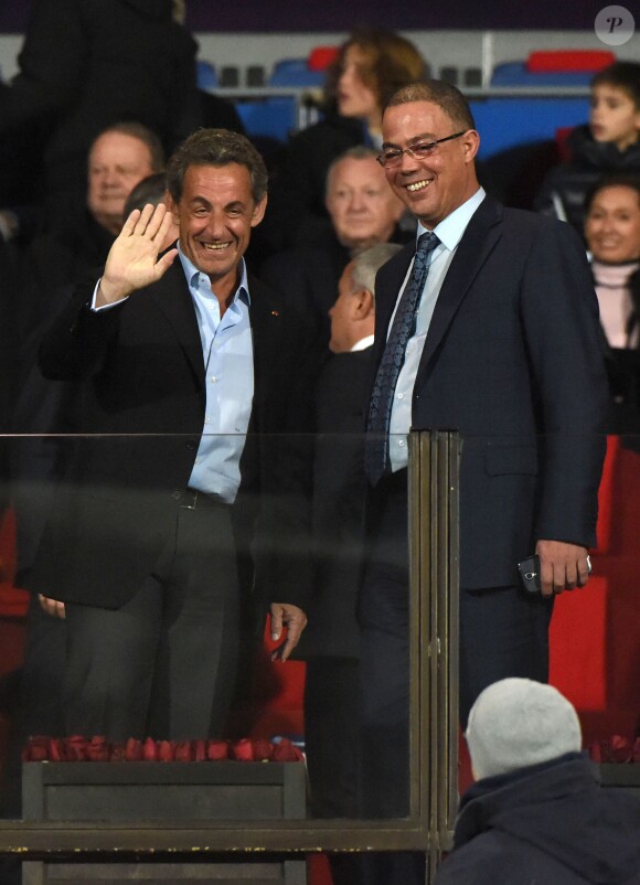 La président de l'UMP, Nicolas Sarkozy, assiste au match amical PSG - Inter de Milan à Marrakech le 30 décembre 2014.
