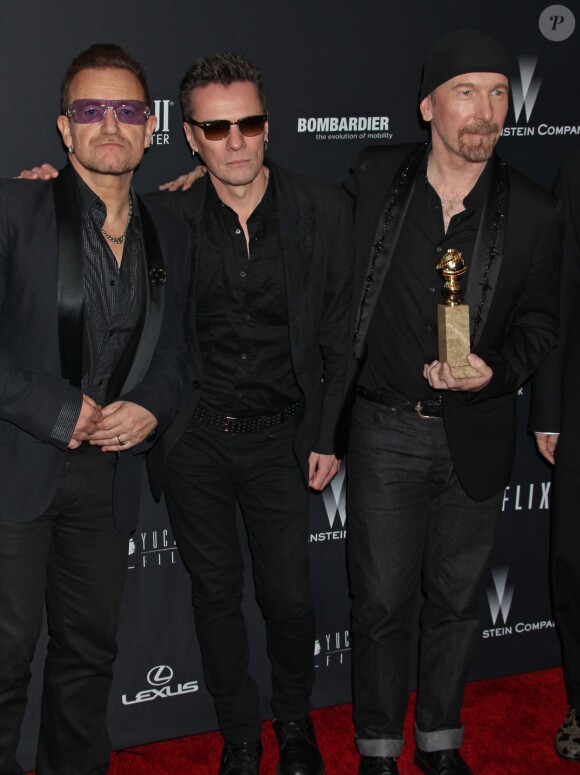 Le groupe U2 après les Golden Globe Awards à Los Angeles, le 12 janvier 2014.
