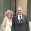 Georges Wolinski et son épouse Maryse au palais de l'Elysée à Paris, le 27 juin 2005