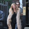 Kate Moss, tout sourire le jour de ses 41 ans et suivie par son mari Jamie Hince, quitte son domicile. Londres, le 16 janvier 2015.