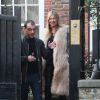 Kate Moss, tout sourire le jour de ses 41 ans et suivie par son mari Jamie Hince, quitte son domicile. Londres, le 16 janvier 2015.