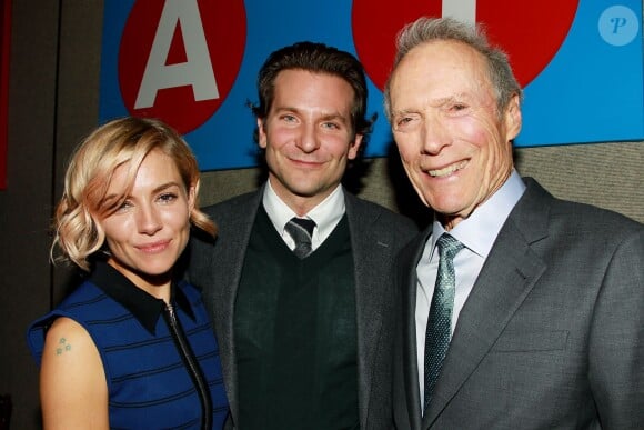Sienna Miller, Bradley Cooper et Clint Eastwood à New York le 15 décembre 2014.