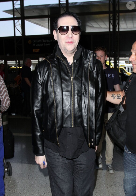Marilyn Manson à son arrivée à l'aéroport LAX de Los Angeles le 25 juin 2014