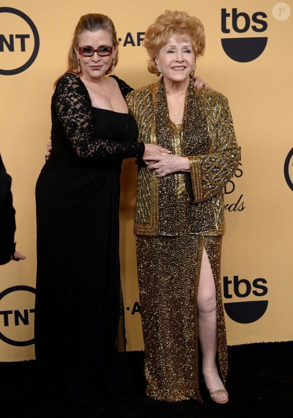 Debbie Reynolds et Carrie Fisher à la 21e cérémonie des Screen Actors Guild Awards remis au Shrine Auditorium à Los Angeles, le 25 janvier 2015.