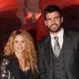 La chanteuse Shakira, enceinte, et Gerard Piqué lors des 100 ans de la marque Puig à Barcelone le 22 octobre 2014.