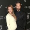 Blake Lively (enceinte) et son mari Ryan Reynolds lors du "Angel Ball 2014" à New York, le 20 octobre 2014.
