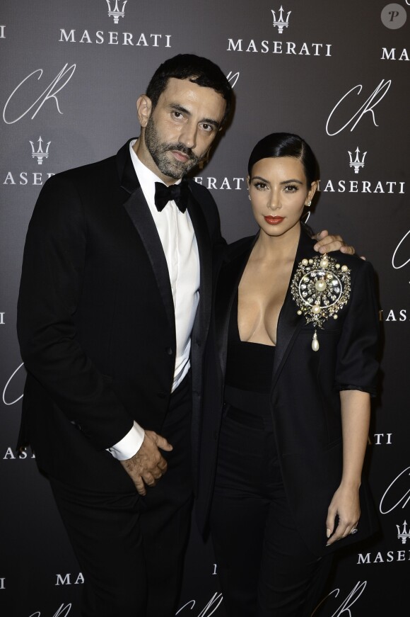 Riccardo Tisci et Kim Kardashian à la soirée de parution du CR Fashion Book Issue N°5. Paris, le 30 septembre 2014.