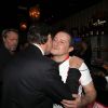 Exclusif - Christian Estrosi embrasse Franck Viano, cuisinier niçois - Soirée de l'Asssociation des Journalistes Niçois au Palais Maillot à Paris le 18 février 2015.