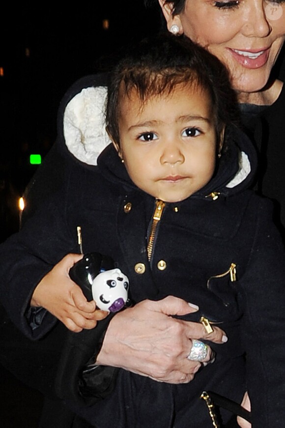 Exclusif - North West dans les bras de sa mamie Kris Jenner à Paris. Le 4 mars 2015.