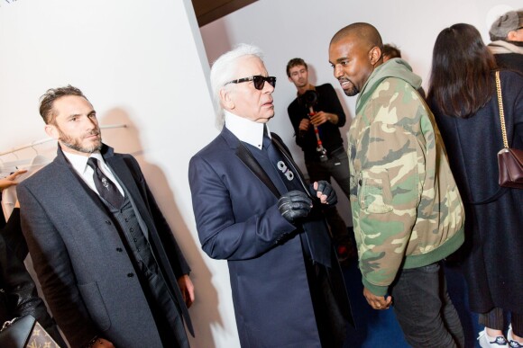 Sebastien Jondeau, Karl Lagerfeld et Kanye West au showroom des prétendants au LVMH Prize, avenue Montaigne. Paris, le 4 mars 2015.