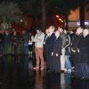 Le compagnon de Camille Muffat, William Forgues, Christian Estrosi, rassemblés pour rendre un dernier hommage à Camille Muffat sur la promenade du Paillon à Nice , le 10 mars 2015