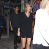 La chanteuse Taylor Swift lors d'une soirée à Los Angeles en compagnie de son jeune frère Austin le 15 mars 2015