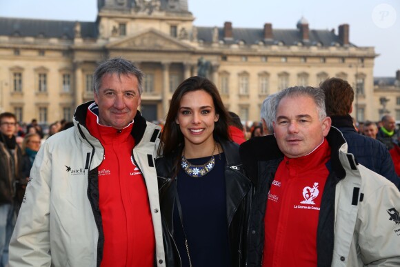 Marine Lorphelin avec des coureurs de l'équipe Oasics - 29e Course du coeur pour soutenir le don d'organes à Paris le 18 mars 2015.