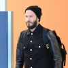 David Beckham arrive à l'aéroport de Miami, le 22 mars 2015.