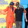 Nick Cannon et Chris Rock assistent à la 28e édition des Kids Choice Awards, au Forum. Inglewood, Los Angeles, le 28 mars 2015.