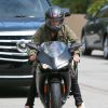 Exclusif - Prix Spécial - Justin Bieber fait de la moto à Los Angeles, le 17 mars 2015. Le chanteur a customisé sa moto Ducati avec ses initiales "JB". Escorté par ses gardes du corps, Justin a suivi la voiture de Corey Gamble