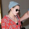 Kristen Stewart va prendre un avion à l'aéroport de LAX à Los Angeles, le 5 avril 2015.