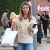 Exclusif - Mischa Barton, accompagnee d'une amie, s'achete de la marijuana dans un magasin specialise a Silverlake. La jeune fille a beaucoup grossi depuis quelques mois. le 7 decembre 2013  For germany call for price Exclusive - Mischa Barton and a friends stop by a medical marijuana store to pick up some weed before heading to the Ragg Mopp Vintage clothing store to shop for clothes in Silverlake, California on December 7, 2013. Mischa has put on a bunch of weight in the last couple of months07/12/2013 - Silverlake