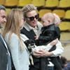 La princesse Charlène de Monaco porte sa nièce Kaia, la fille de son frère Gareth, en compagnie de sa future belle soeur Roisin Galvin lors de la 5e édition du "Tournoi Sainte-Dévote" organisé par la Fondation Princesse Charlène de Monaco et la Fédération Monégasque de Rugby au Stade Louis II à Monaco, le samedi 11 avril 2015.