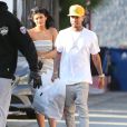 Exclusif - Kylie Jenner et Tyga remontent en voiture après une petite séance shopping. Los Angeles, le 14 avril 2015.