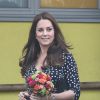 Kate Middleton à Londres le 18 mars 2015, en visite dans un foyer pour enfants, à un mois du terme de sa seconde grossesse.