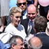 Albert II de Monaco et son épouse Charlene à la rencontre des Monégasques en remontant la rue Bellando de Castro vers la place du Palais - Baptême de Jacques et Gabriella en la cathédrale Notre-Dame-Immaculée de Monaco le 10 mai 2015