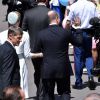 Albert II de Monaco et son épouse Charlene à la rencontre des Monégasques en remontant la rue Bellando de Castro vers la place du Palais - Baptême de Jacques et Gabriella en la cathédrale Notre-Dame-Immaculée de Monaco le 10 mai 2015