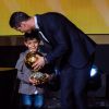 Cristiano Ronaldo avec son fils Cristiano Jr lors de la remise du Ballon d'Or 2014 à Zurich, le 12 janvier 2015