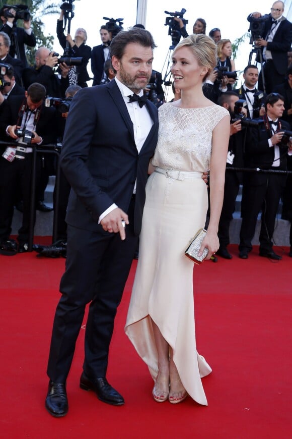Clovis Cornillac et sa femme Lilou Fogli (robe Alexis Mabille) - Montée des marches du film "Inside Out" (Vice-Versa) lors du 68e Festival International du Film de Cannes, le 18 mai 2015.