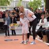 Maria Sharapova avait rendez-vous avec Kei Nishikori et Michael Chang pour un événement organisé par Tag Heuer pour l'association Théodora, sur les Champs Elysées, le 18 mai 2015 à Paris