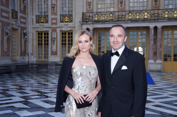 Diane Kruger et Philippe Guettat, PDG de Martell Mumm Perrier-Jouët - Soirée du tricentenaire de la Maison Martell au château de Versailles le 20 mai 2015. Diane Kruger est l'égérie de Martell pour le tricentenaire de cette marque de cognac du groupe Pernod-Ricard.