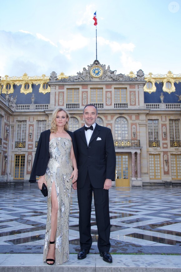 Diane Kruger et Philippe Guettat, Président-directeur général de Martell Mumm Perrier-Jouët - Soirée du tricentenaire de la Maison Martell au château de Versailles le 20 mai 2015. Diane Kruger est l'égérie de Martell pour le tricentenaire de cette marque de cognac du groupe Pernod-Ricard.