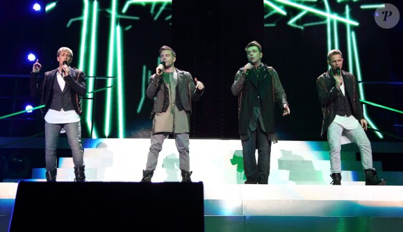 Kian Egan, Shane Filan, Mark Feehily, Nicky Byrne  du groupe Westlife en concert à l'echo Arena à Liverpool, le 15 mai 2012