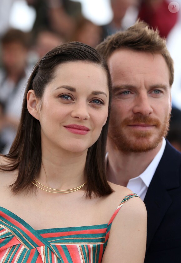 Michael Fassbender et Marion Cotillard - Photocall du film "Macbeth" lors du 68e Festival International du Film de Cannes, le 23 mai 2015.