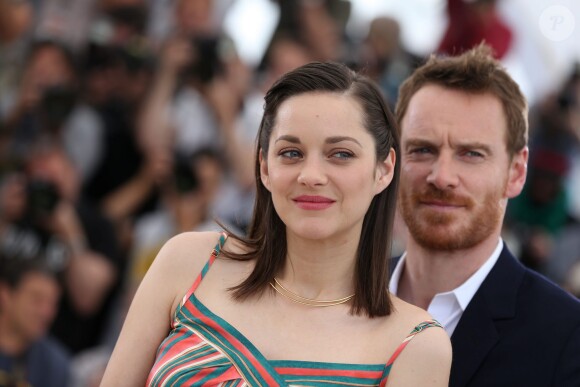 Michael Fassbender et Marion Cotillard - Photocall du film "Macbeth" lors du 68e Festival International du Film de Cannes, le 23 mai 2015.