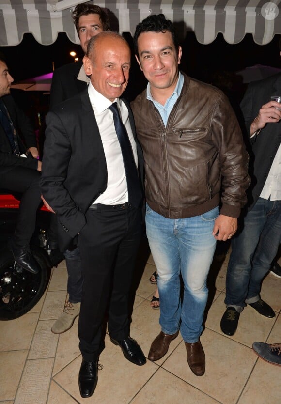 Exclusif - Jean-Michel Aphatie et Thomas Thouroude participent à la dernière soirée à la suite Sandra and Co organisée à l'occasion du 68e Festival international du film de Cannes, le 22 mai 2015.
