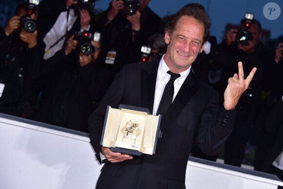 Vincent Lindon (prix d'interprétation masculine pour le film "La Loi du Marché") - Photocall de la remise des palmes du 68e Festival du film de Cannes le 24 mai 2014