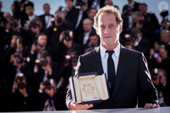 Vincent Lindon (prix d'interprétation masculine pour le film "La Loi du Marché") - Photocall de la remise des palmes du 68e Festival du film de Cannes le 24 mai 2014