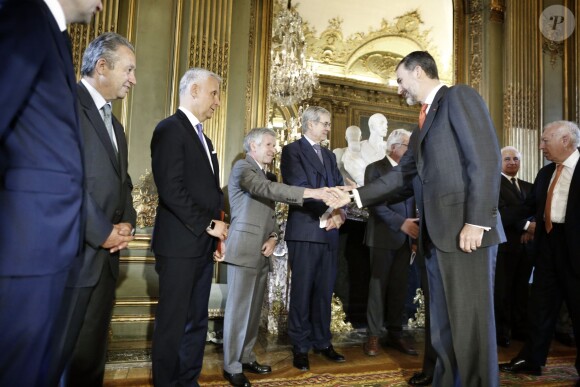 King Felipe VI of Spain greets guests during a breakfast with representatives of the French and Spanish economic communities hosted by Spain's ambassador to France Ramon de Miguel Egea at his residence in Paris, France on June 4, 2015. The Spanish royal couple are on a three-day official state visit to France. Photo by Denis Allard/Pool/ABACAPRESS.COM04/06/2015 - Paris