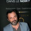 Frédéric Lopez lors de la soirée pour le 10e anniversaire du restaurant "Dans le Noir" à Paris, le 14 juillet 2014.