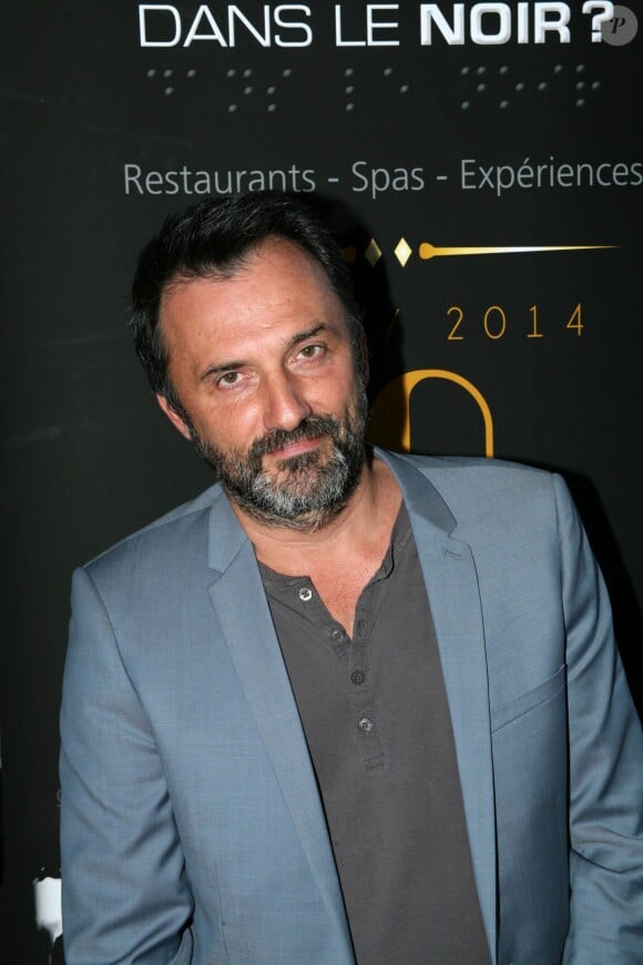 Frédéric Lopez lors de la soirée pour le 10e anniversaire du restaurant "Dans le Noir" à Paris, le 14 juillet 2014.
