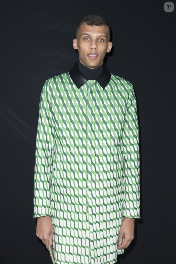 Stromae au défilé de mode "Valentino" à Paris. Le 10 mars 2015.