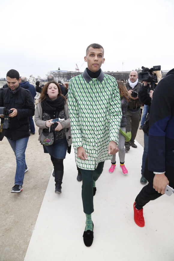 Stromae au défilé de mode "Valentino" à Paris. Le 10 mars 2015.