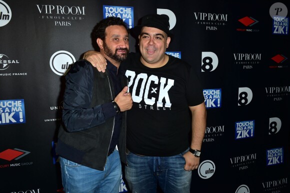 Cyril Hanouna et le Dj Tefa, lors du showcase à l'occasion de la sortie du disque TPMZ - Touche pas à ma Zik au VIP Room à Paris, le 12 juin 2015.