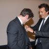 Exclusif - Jalil Lespert est décoré Chevalier dans l'Ordre des Arts et des Lettres par Yannick Bolloré lors d'une cérémonie organisée au cinéma Mac Mahon à Paris, le 9 juin 2015.